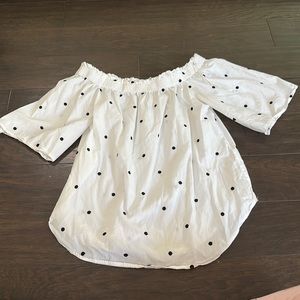 Off the shoulder black and white polkadot shirt